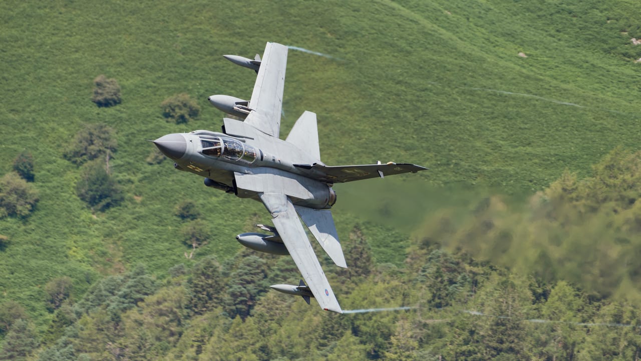 RAF Tornado GR4 banking low through the Mach Loop valleys