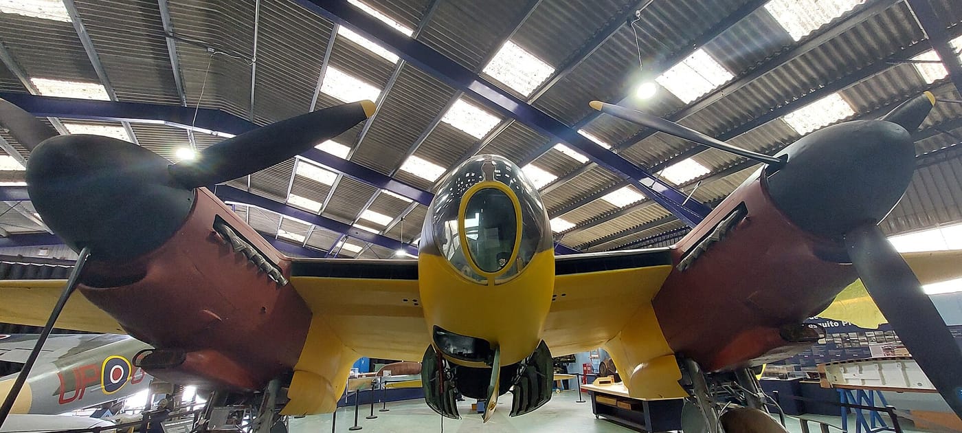 The yellow prototype Mosquito W4050 in the hangar at the de Havilland Aircraft Museum, London Colney