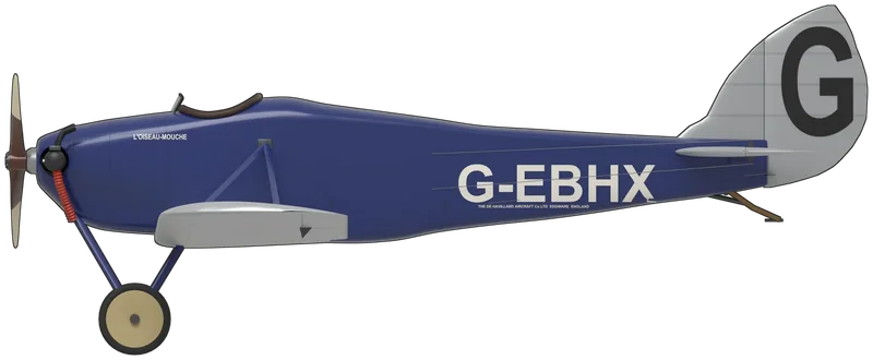 Side profile of the D.H.53 Humming Bird, painted as G-EBHX, the Shuttleworth Collection’s de Havilland D.H.53 Humming Bird (c/n 98), the first prototype, first flown at Stag Lane in 1923 and entered as No. 8 ‘L’Oiseau-Mouche’ in that year’s Lympne light aeroplane trials, rebuilt in 1960 by the de Havilland Aeronautical Technical School and flown from Old Warden until it crashed in July 2012, since rebuilt and awaiting completion: Geoffrey de Havilland’s single-seat motor-glider, a wooden monoplane of 30 ft span with a strut-braced, fabric-covered low wing, an open cockpit and a 34 hp ABC Scorpion II flat-twin whose two cylinders stand out bare from each side of the nose, shown standing tail-down on its V-strut main gear and tailskid as last photographed complete at Old Warden: a royal blue fuselage, cowling, struts and undercarriage legs, silver-doped wings and tail with the fabric sagging between the ribs, a white ‘G-EBHX’ on both sides of the rear fuselage with a small maker’s legend beneath, a white ‘L’OISEAU-MOUCHE’ under the cockpit, a large black ‘G’ on the rudder, buff wheel covers and a wooden propeller with cream outer blades (the small legend under the registration is too small to read in photographs, so its wording is not a transcription)