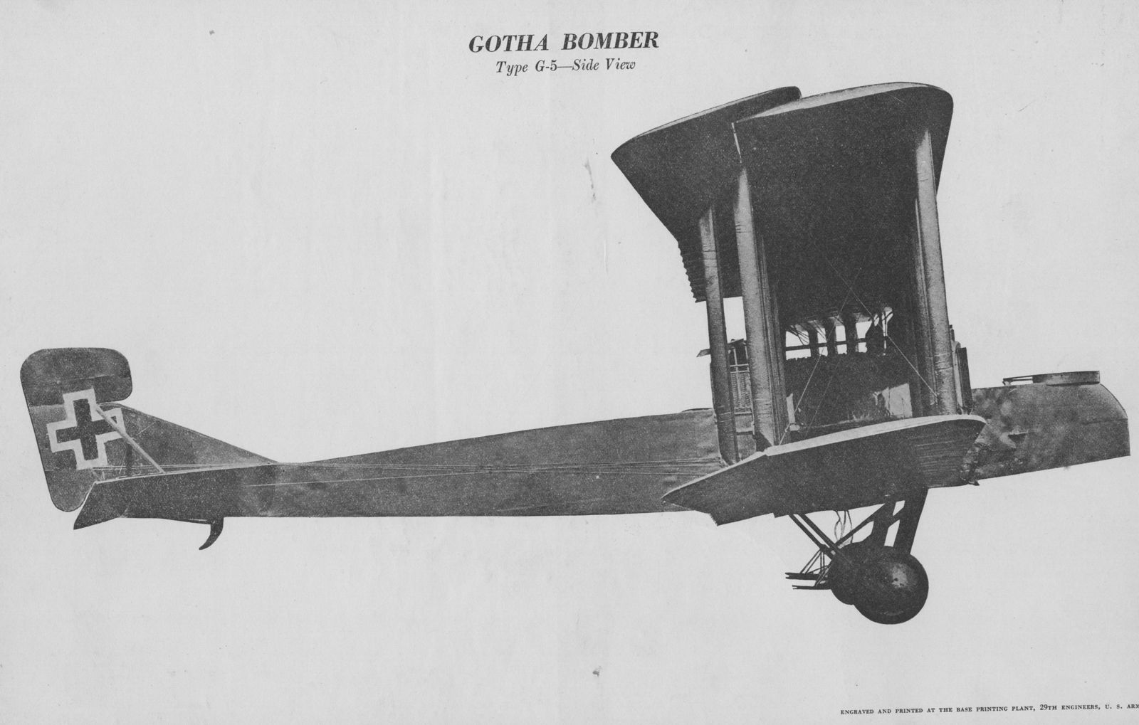 Side view of a large German twin-engined Gotha G.V biplane bomber in flight, a cross on its fin, printed on an American intelligence recognition sheet