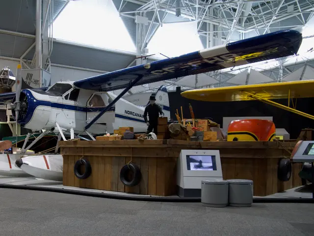 Blue and yellow de Havilland Canada Beaver floatplane displayed on a dock in the bush-flying gallery