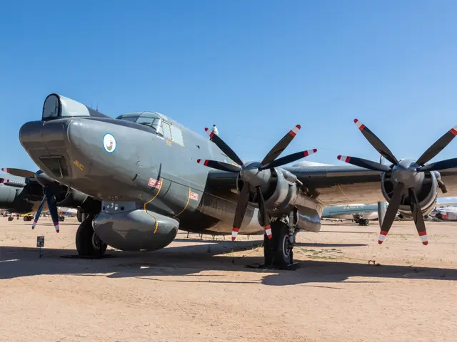 Grey Avro Shackleton with contra-rotating propellers parked outdoors