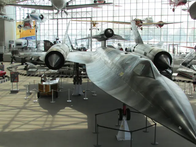 Head-on view of the black titanium M-21 with the D-21 drone mounted on its back