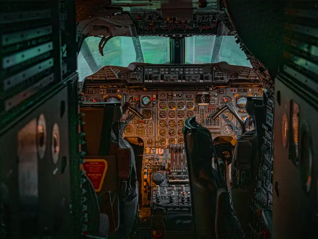 Concorde cockpit with three crew seats and dense analogue instrument panels behind a glass screen