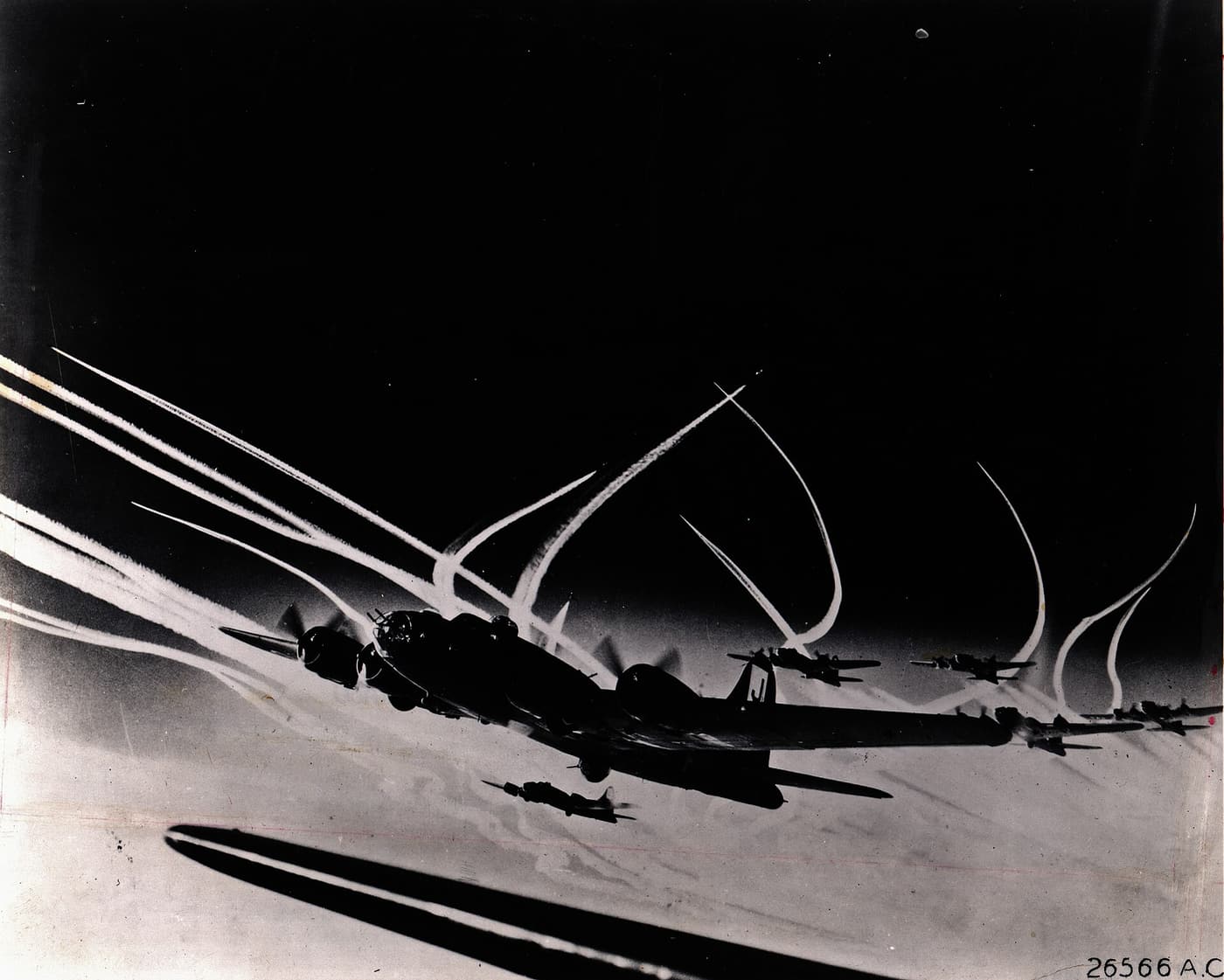 B-17F Flying Fortresses in formation at high altitude, white contrails curving across a dark sky